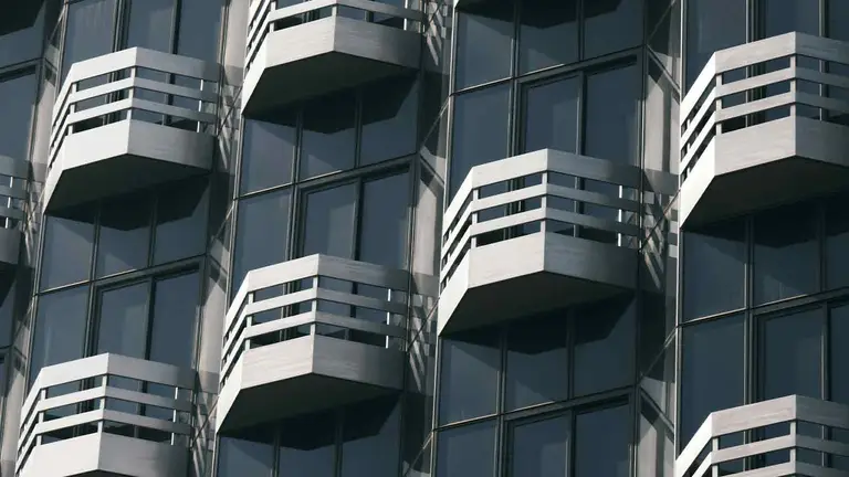 Balconied apartment building where every unit needs a recorded release of mortgage