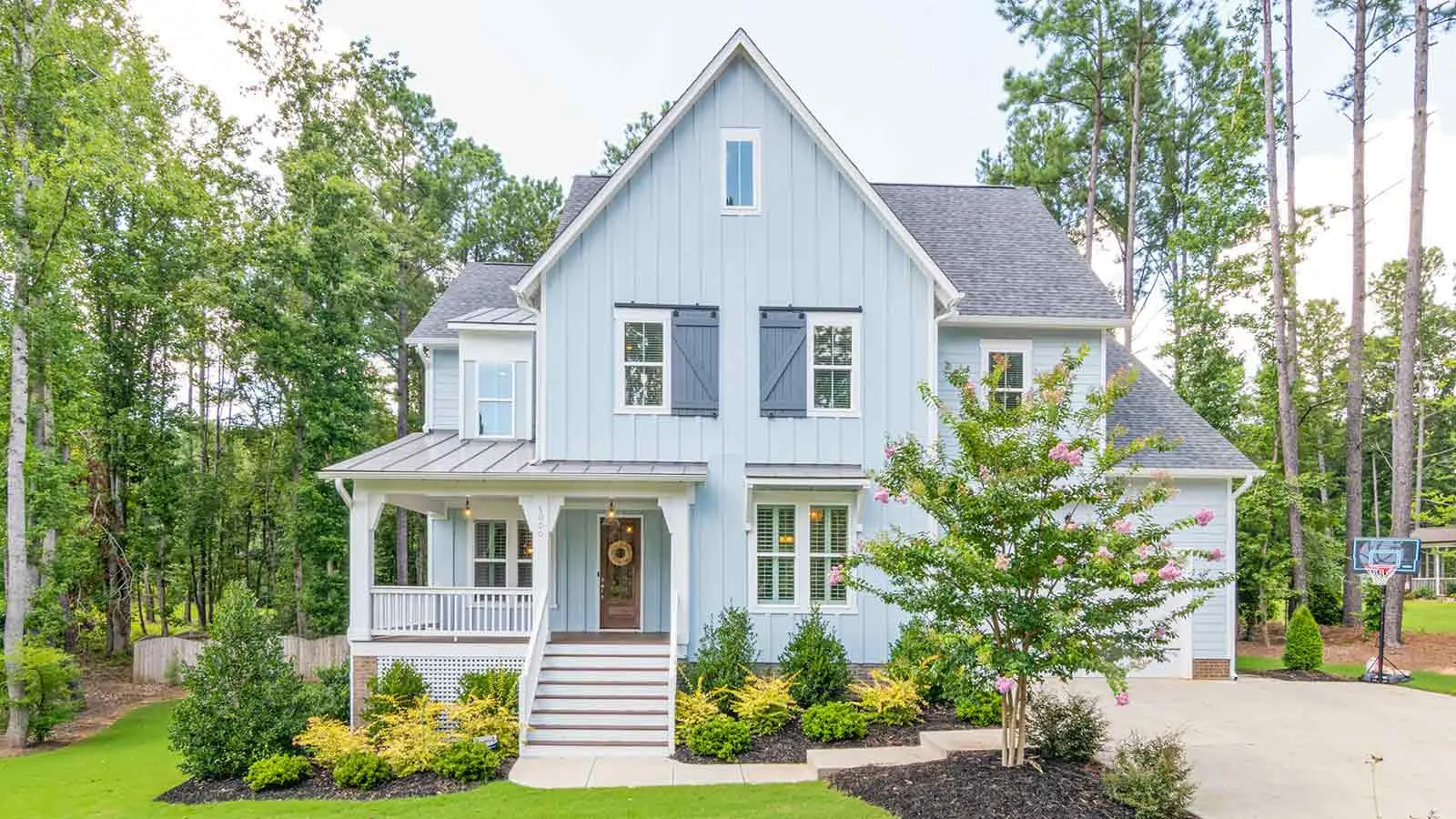 Pale-blue farmhouse held in an estate pending a probate property title search